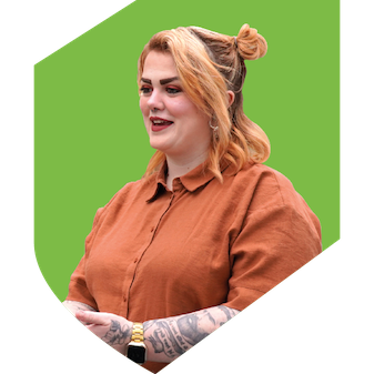 Woman-orange-hair-green-shield
