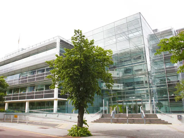 Endeavour house view from outside with a big tree