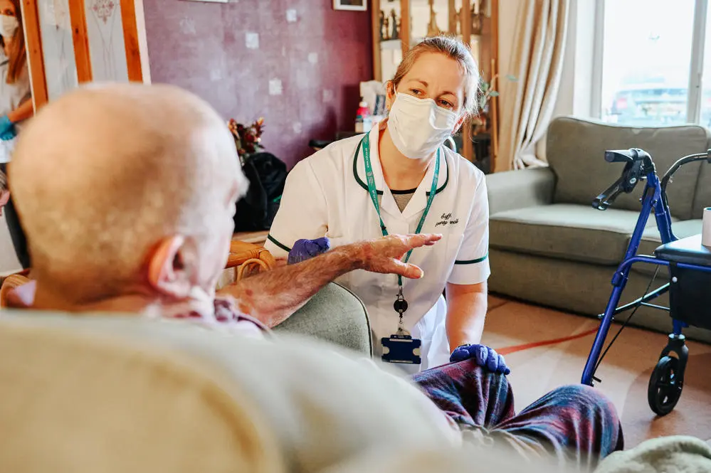 home first worker talking to a vulnerable resident