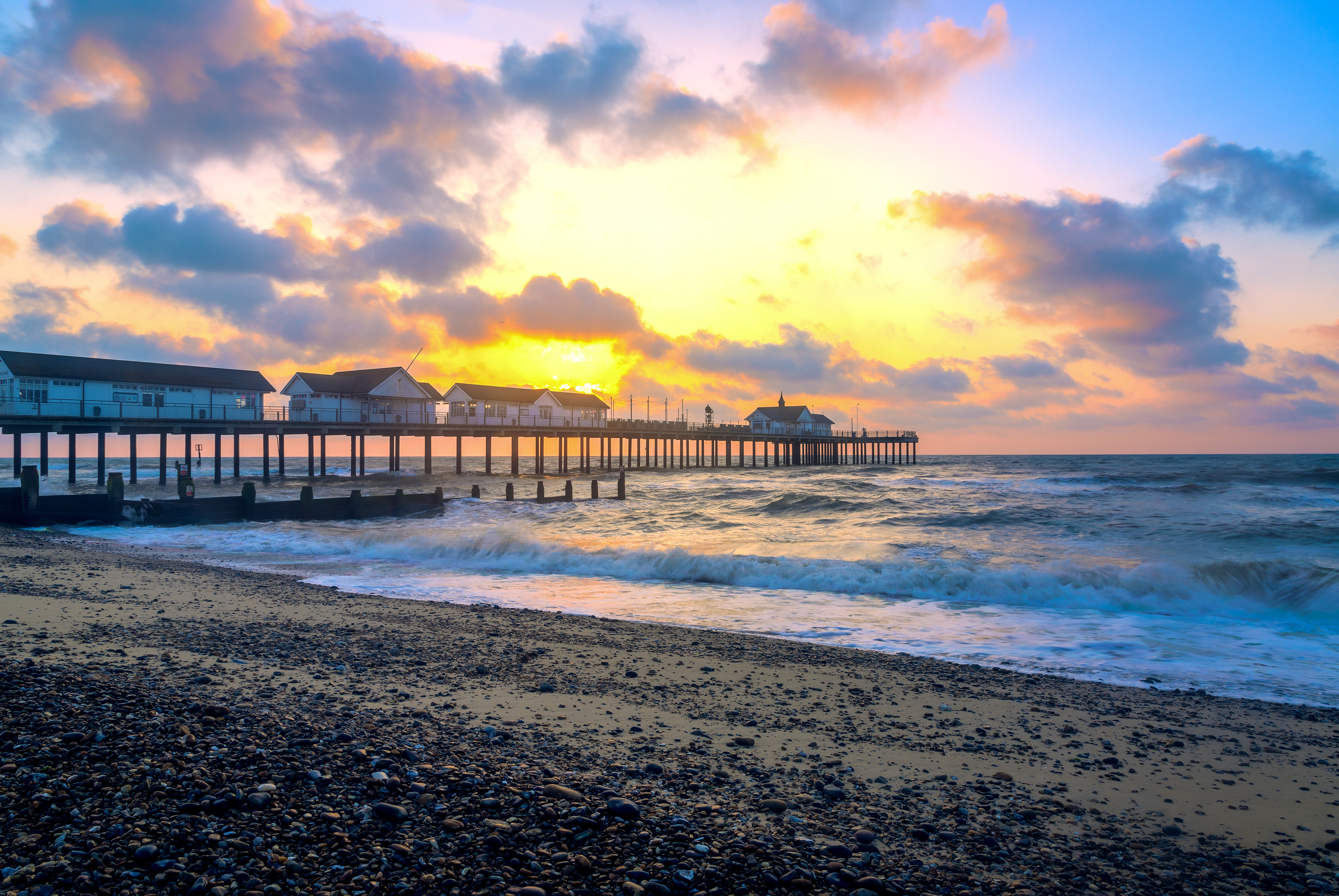 A beach and pier in Suffolk